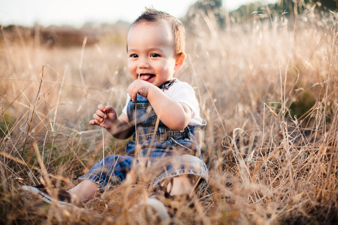 Baby In Field Backlit After